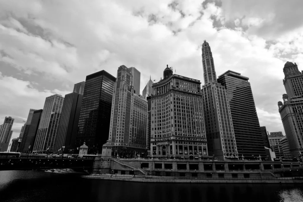InfluenceWP Black and white skyline of iconic Chicago buildings along the river